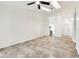 Bright living room features neutral tile flooring, high ceilings, and modern light fixtures at 232 Hunter Ct, Palm Harbor, FL 34684