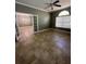 Versatile office space with tile flooring and natural light, accessible through elegant french doors at 2603 Valencia Grove Dr, Valrico, FL 33596