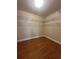 A large walk-in closet with wood floors and metal shelving at 2603 Valencia Grove Dr, Valrico, FL 33596
