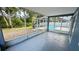 Enclosed lanai overlooking the backyard and pool area at 28818 Midnight Star Loop, Wesley Chapel, FL 33543