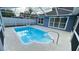 Screened-in pool offers private relaxation with easy access from the house at 28818 Midnight Star Loop, Wesley Chapel, FL 33543