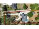 Aerial view of home with long private driveway, pool, lush trees, and bordered by a red line at 3114 Little Rd, Valrico, FL 33596