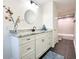 Bathroom features granite counters, stylish faucet and tub with tile surround at 3114 Little Rd, Valrico, FL 33596
