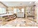 Bathroom featuring a garden tub with mosaic accents, dual vanity, and glass shower at 3114 Little Rd, Valrico, FL 33596