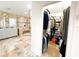 Bathroom and walk-in closet featuring tile flooring and lots of space at 3114 Little Rd, Valrico, FL 33596