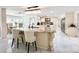 Spacious gourmet kitchen features a center island, breakfast bar, and ample storage at 3114 Little Rd, Valrico, FL 33596
