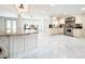 Bright and spacious kitchen with stainless steel appliances and marble flooring at 3114 Little Rd, Valrico, FL 33596