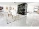 Living room with marble tile and fireplace at 3114 Little Rd, Valrico, FL 33596