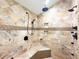 Shower featuring multiple shower heads and mosaic accents at 3114 Little Rd, Valrico, FL 33596