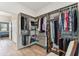 Spacious walk-in closet with custom organizers for neat storage and ample hanging space at 31637 Cannon Rush Dr, San Antonio, FL 33576