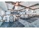 Large event space with round tables, chairs, and elegant lighting for gatherings and celebrations at 31637 Cannon Rush Dr, San Antonio, FL 33576