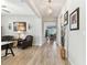 Stylish hallway with wood-look floors and a view of the living area at 31637 Cannon Rush Dr, San Antonio, FL 33576