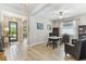 Spacious home office with wood-look floors and view into the entry at 31637 Cannon Rush Dr, San Antonio, FL 33576