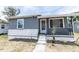 Attractive home featuring a welcoming entrance and neat landscaping, enhancing its appeal at 3253 57Th N Ave, St Petersburg, FL 33714