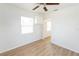 Bright living room features wood floors, storage and ample natural light at 3253 57Th N Ave, St Petersburg, FL 33714