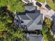 Overhead view showcases a well-maintained roof, landscaped backyard, and private driveway at 3311 Home Ct, Tampa, FL 33611
