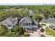 Beautiful aerial view showcasing a well-maintained home with a manicured lawn and mature trees at 3311 Home Ct, Tampa, FL 33611