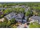 Spacious home nestled among lush trees, with a well-kept lawn and a charming driveway at 3311 Home Ct, Tampa, FL 33611