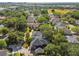 Expansive property featuring well-maintained homes, lush greenery, and mature trees at 3311 Home Ct, Tampa, FL 33611