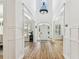 Bright, spacious foyer with soaring ceilings, hardwood floors, and elegant architectural details at 3311 Home Ct, Tampa, FL 33611