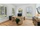 Bright office space with hardwood floors, plantation shutters and a custom wood desk at 3311 Home Ct, Tampa, FL 33611