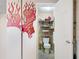 This unique bathroom features a fun 'Personal Cave' theme, adding a playful touch to the functional space at 3338 Hoover Dr, Holiday, FL 34691