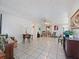 Spacious living room featuring neutral walls and tile flooring at 3338 Hoover Dr, Holiday, FL 34691