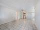 Bright and airy living room featuring tile flooring and lots of space at 3338 Hoover Dr, Holiday, FL 34691