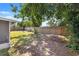 Large fenced backyard offering privacy and space for outdoor activities, perfect for enjoying the sunshine at 4220 Oakfield Ave, Holiday, FL 34691