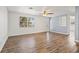 Inviting living room with hardwood floors, bright natural light, and contemporary finishes at 4220 Oakfield Ave, Holiday, FL 34691