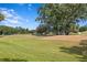 This well-manicured golf course and landscape, perfect for an afternoon on the green at 4240 Golf Club Ln, Tampa, FL 33618