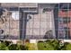 Aerial view of screened patio with brick pavers and outdoor seating at 4240 Golf Club Ln, Tampa, FL 33618