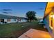A view from the back patio shows the well-manicured lawns and common space between residences at 4301 Avanti Cir, New Port Richey, FL 34655