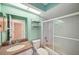 Bathroom with a sink, toilet, bathtub with a shower head, and toiletries at 4301 Avanti Cir, New Port Richey, FL 34655