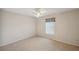 Bedroom with wood floors, ceiling fan and natural light at 4301 Avanti Cir, New Port Richey, FL 34655