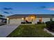 Single Gathering home featuring a two-car garage at 4301 Avanti Cir, New Port Richey, FL 34655