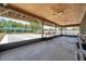 Interior view of the shuffleboard shelter, overlooking the shuffleboard courts and parking area at 4301 Avanti Cir, New Port Richey, FL 34655