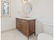 Bathroom with wooden vanity, marble countertop, and stained glass window at 4515 20Th N St, St Petersburg, FL 33714