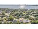 Beautiful aerial shot displaying the neighborhood, lush green canopy, and a stunning bay view at 481 W Davis Blvd, Tampa, FL 33606