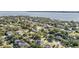 Magnificent aerial view capturing the neighborhood, waterfront access, and the tranquil bay in the background at 481 W Davis Blvd, Tampa, FL 33606