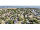 Scenic aerial view of the neighborhood, surrounded by mature trees and close to the bay at 481 W Davis Blvd, Tampa, FL 33606