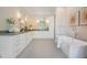 Spacious bathroom featuring double sinks, a soaking tub, and ample counter space at 481 W Davis Blvd, Tampa, FL 33606