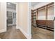 Walk-in closet with custom wood shelving and ample storage at 481 W Davis Blvd, Tampa, FL 33606