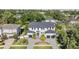 Grand two-story home with manicured front yard, dual garages, and palm tree accents at 481 W Davis Blvd, Tampa, FL 33606