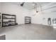 Spacious garage with storage shelves and electric vehicle charging outlets at 481 W Davis Blvd, Tampa, FL 33606
