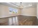 Spacious living room with hardwood floors, recessed lighting, and large windows offering natural light at 481 W Davis Blvd, Tampa, FL 33606