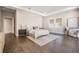 Spacious bedroom featuring hardwood floors, neutral decor, and natural light at 481 W Davis Blvd, Tampa, FL 33606