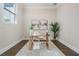 Home office featuring a light wood desk, neutral decor, and natural light from a window at 481 W Davis Blvd, Tampa, FL 33606