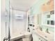 Bright bathroom with walk-in shower and updated fixtures at 5227 81St Lane N # 26, St Petersburg, FL 33709