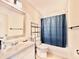 Bathroom with vanity and shower with curtain at 5227 81St Lane N # 26, St Petersburg, FL 33709